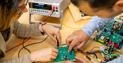 Two students working on a project